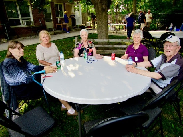 Seniors sitting around a table